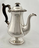 Late Georgian Sheffield plated pedestal coffee pot with foliate decoration. Circa 1825.