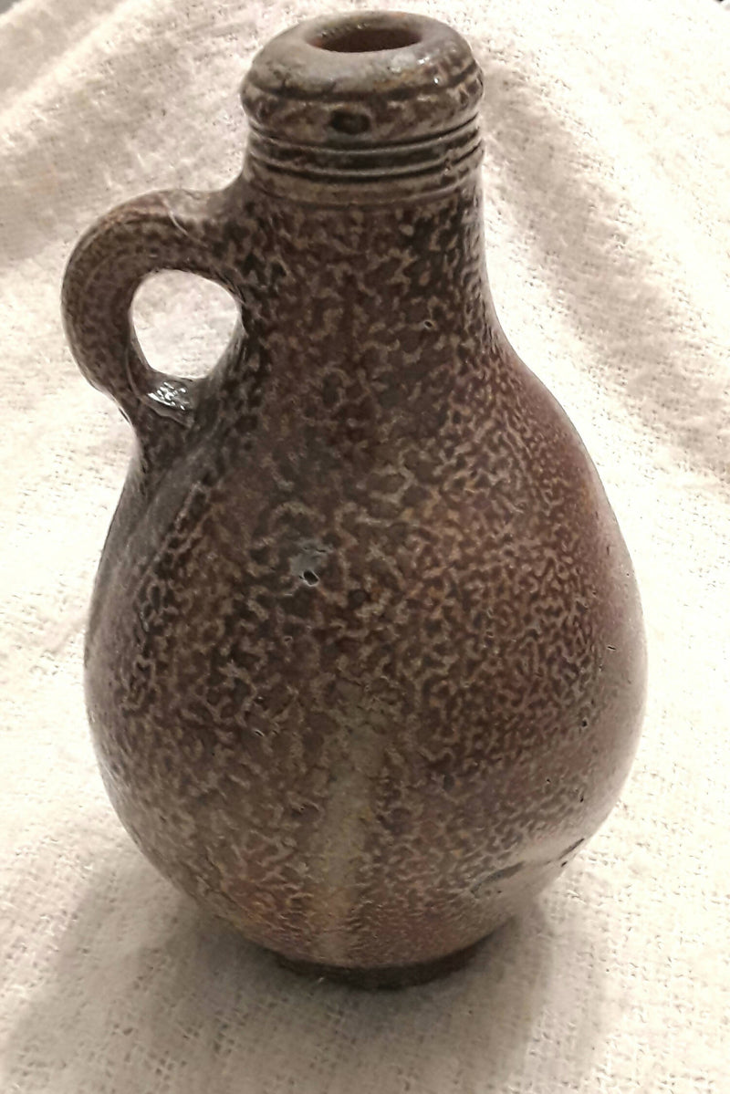 A Stuart Period Tigerglaze Bellarmine Jar.