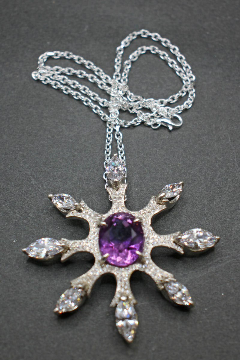 Jake: Amethyst and zirconias silver “snowflake” pendant