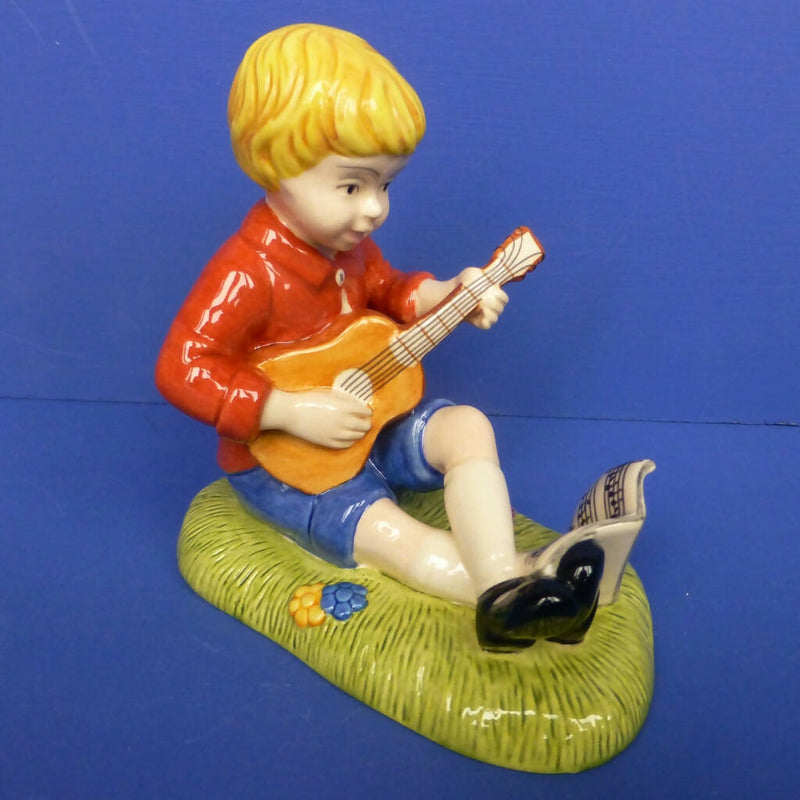 Royal Doulton Winnie The Pooh Figurine - Christopher Robin Strums a Melody