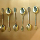 Set of enamelled silver gilt coffee spoons