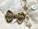Vintage Christian Dior Bow Brooch, gold plate, enamel and rhinestone