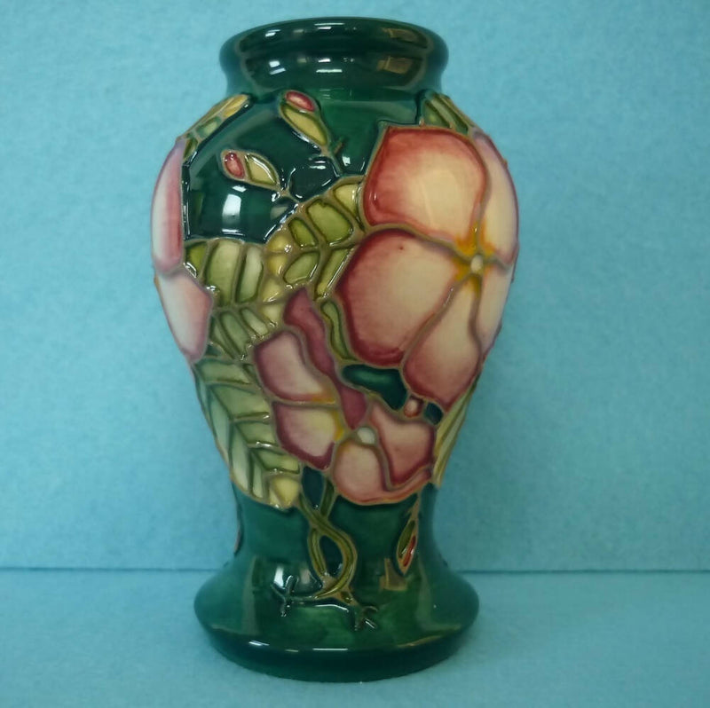 A Small Moorcroft Vase in the Mandeville Design by Angela Davenport.