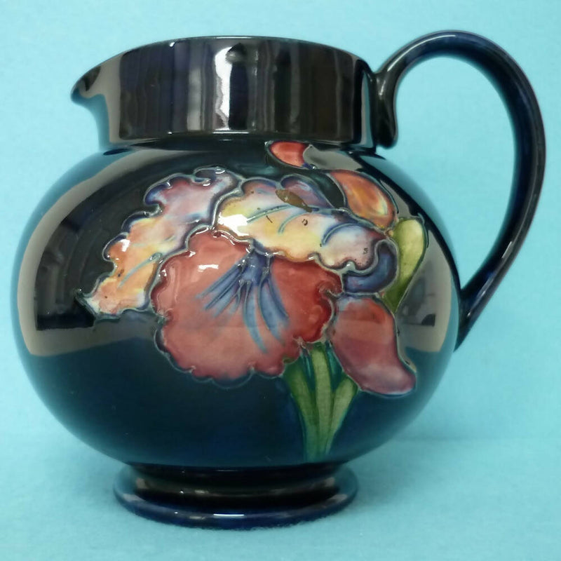 A Moorcroft (c1950's/60's) Jug in the Orchid Pattern by Walter Moorcroft