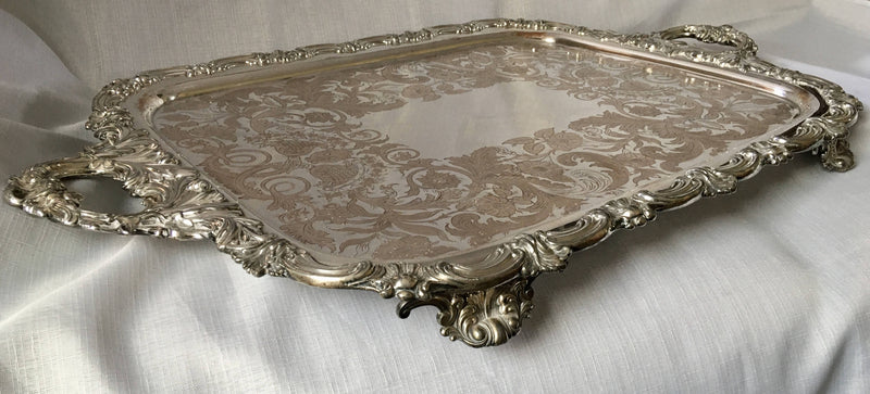 Georgian, George IV period, twin handled Old Sheffield Plate serving tray on four ornate feet. Circa 1820 - 1830.