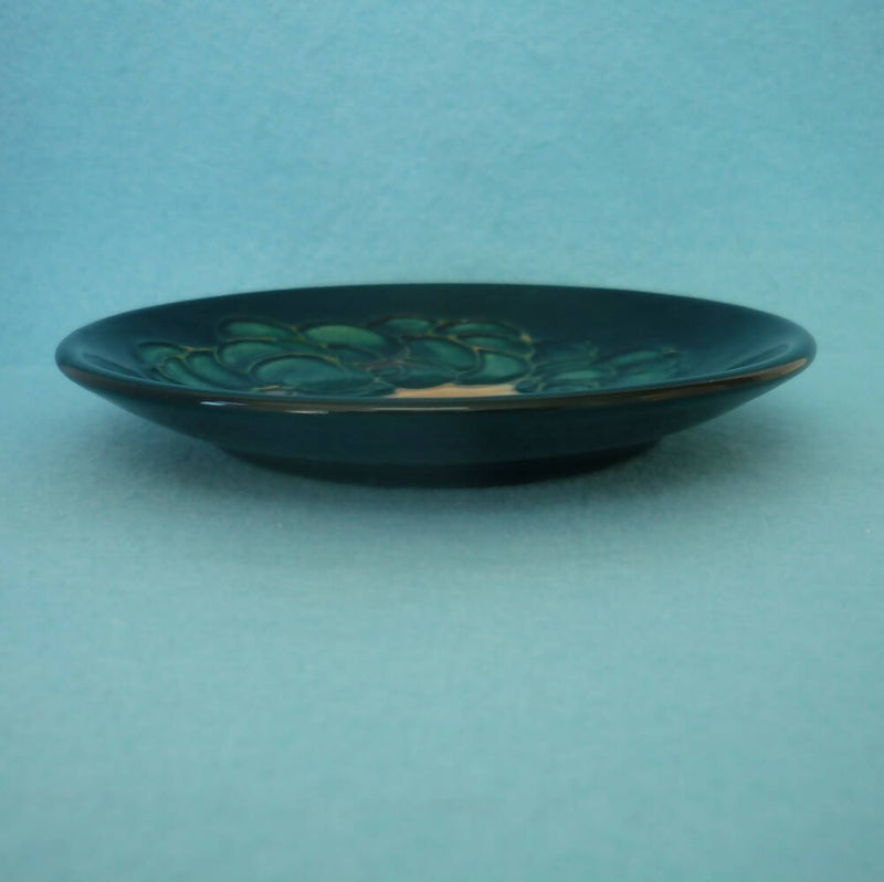 A Moorcroft Pin Dish in the Mamoura Design by Sally Tuffin