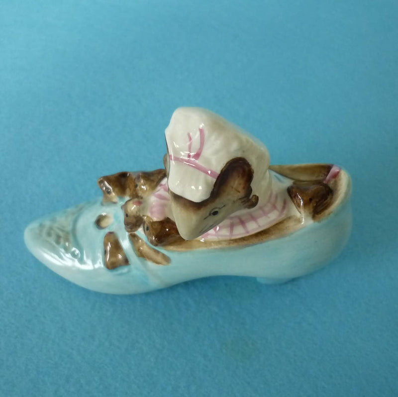 A Beswick Beatrix Potter Figurine The Old Woman who lived in a Shoe. BP3b.