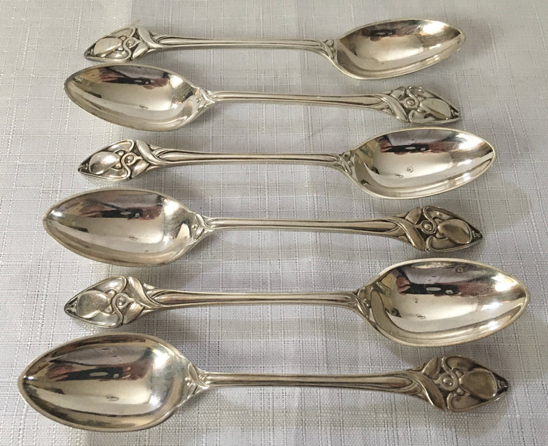 Cased set of six silver plated Art Nouveau teaspoons.