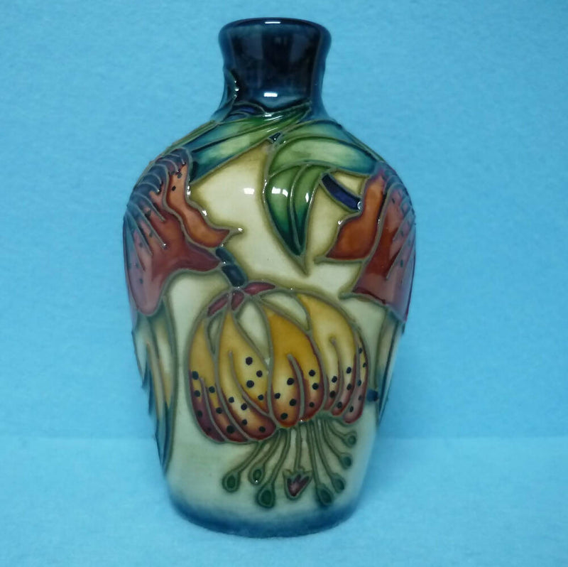 A Boxed Moorcroft Vase in the Anna Lily Design by Nicola Slaney.