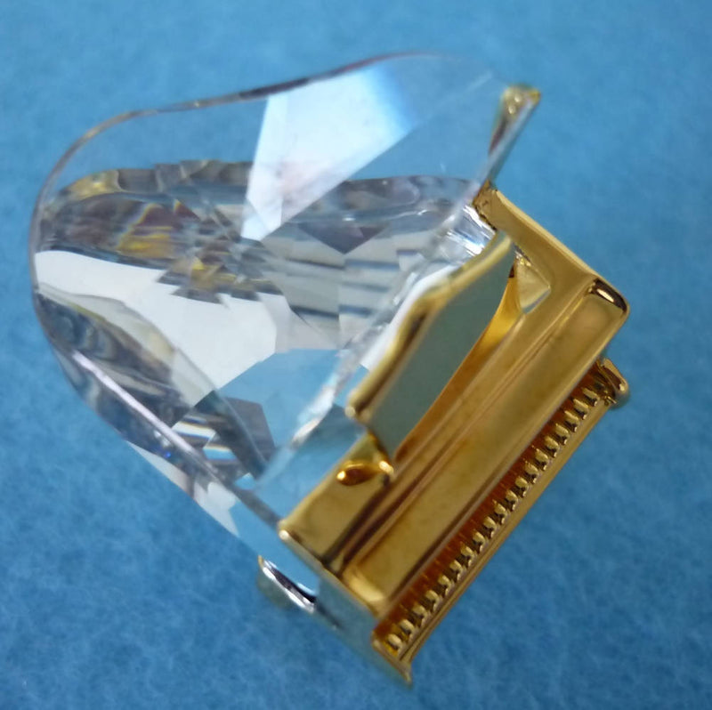A Boxed Swarovski Crystal and Gold Tone Piano Ornament