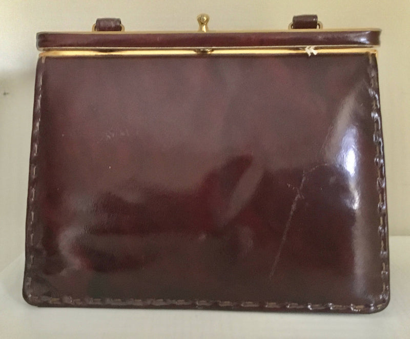 Vintage Bergundy Patent Leather Handbag by Widegate of London.