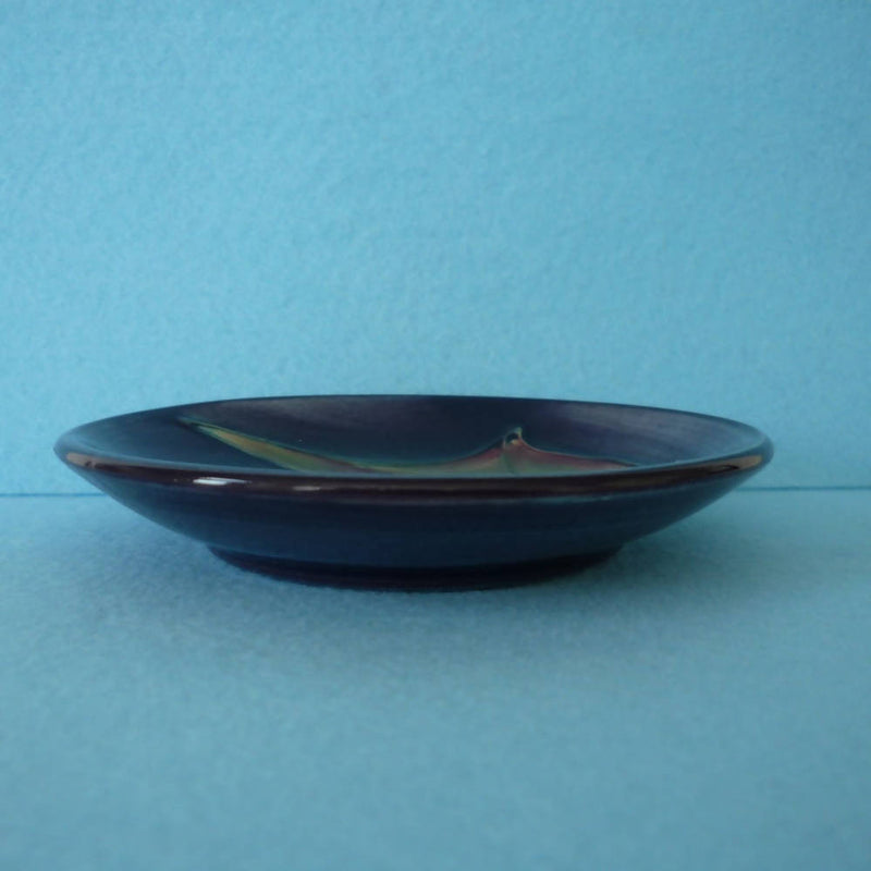 A Moorcroft Pin Dish in the Black Tulip Design by Sally Tuffin