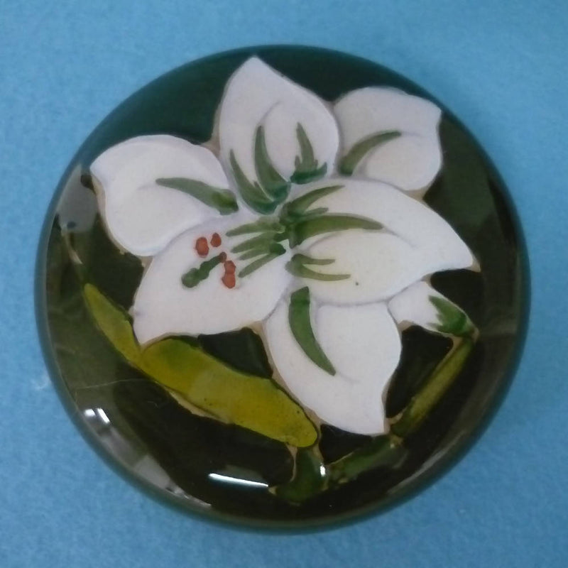 A Moorcroft Ginger Jar in the Bermuda Lily Pattern