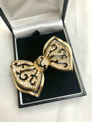 Vintage Christian Dior Bow Brooch, gold plate, enamel and rhinestone