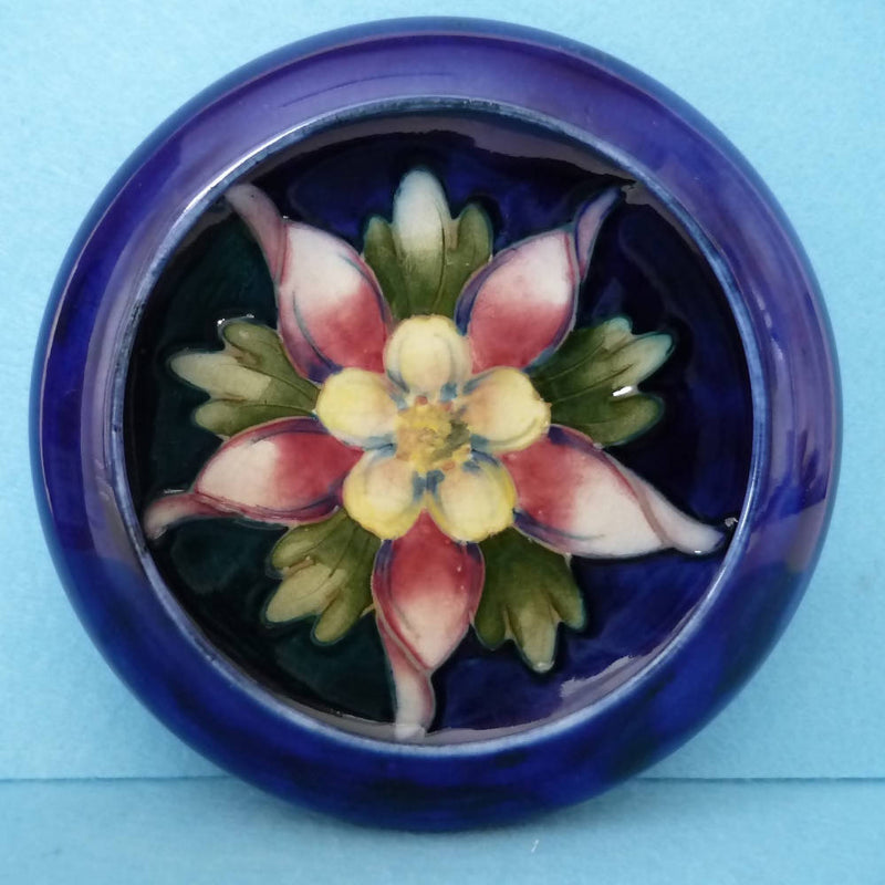 A Moorcroft Inverted Rim Bowl in the Columbine Pattern