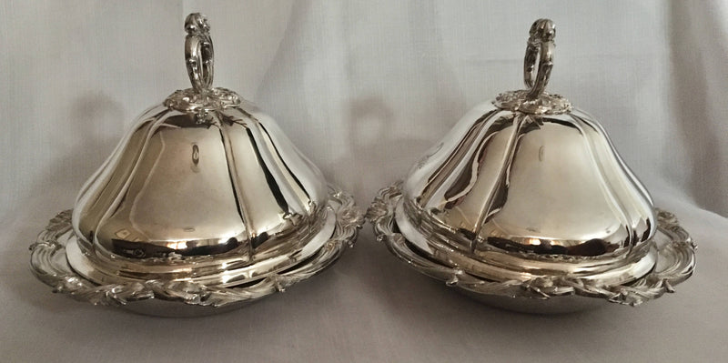 Late Georgian pair of Sheffield Plated, crested, entree dishes and covers.