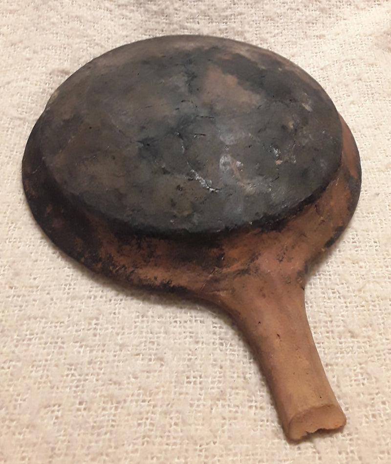 A Medieval Period Terracotta Shallow Skillet.