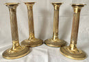 Early 19th Century Set of Four Gilded Old Sheffield Plate Candlesticks.
