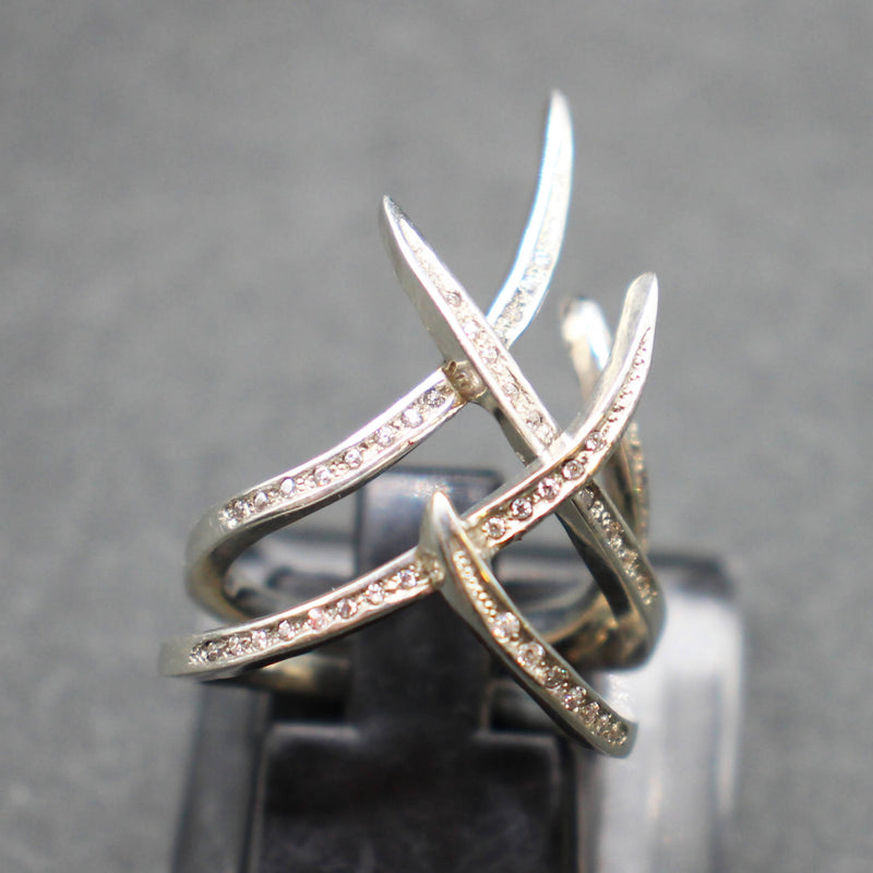 Jake: Pair of interlocking silver “Thorn” rings