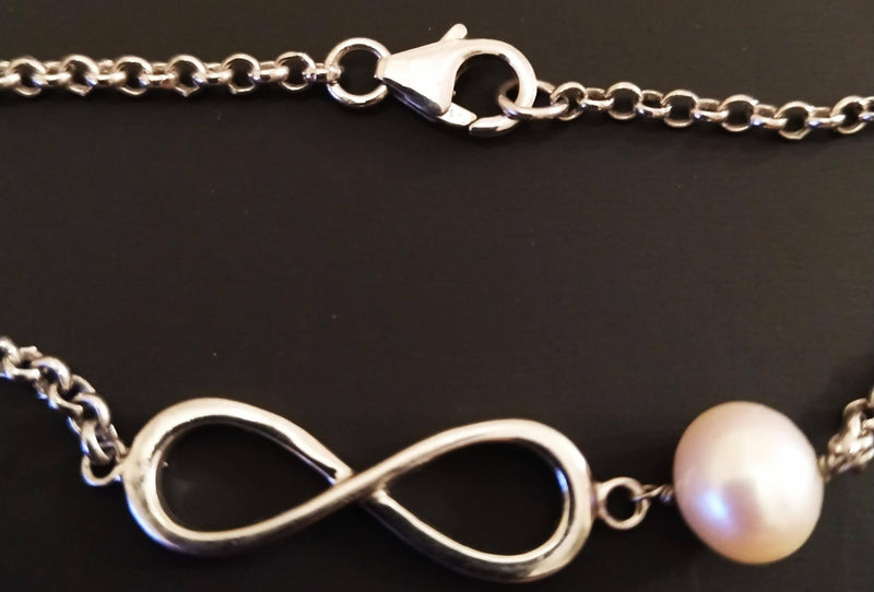 New sterling silver and pearl infinity bracelet