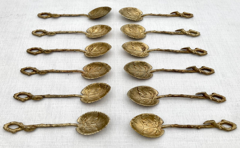 Victorian Cased Set of Twelve Naturalistic Leaf & Vine Form Gilt Metal Teaspoons, circa 1870 - 1890.