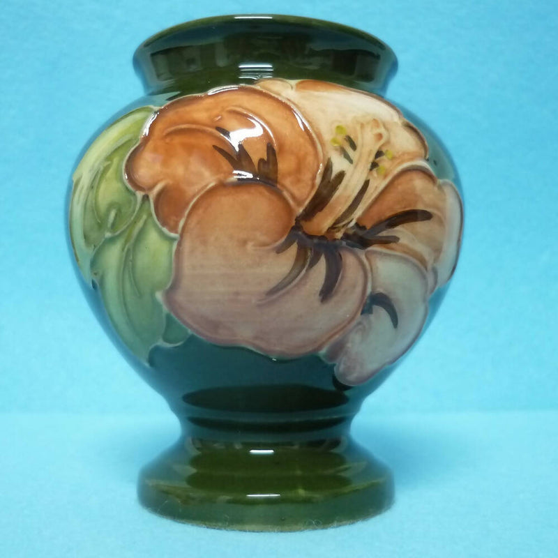 A Moorcroft Baluster Shaped Vase in the Hibiscus Pattern by Walter Moorcroft