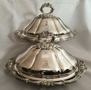 Late Georgian pair of Sheffield Plated, crested, entree dishes and covers.