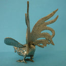 A White Metal Figure of a Cock or Rooster