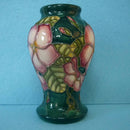 A Small Moorcroft Vase in the Mandeville Design by Angela Davenport.