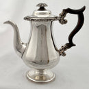 Late Georgian Sheffield plated pedestal coffee pot with foliate decoration. Circa 1825.