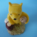 A Boxed Royal Doulton Winnie The Pooh Figurine - Pooh Counting The Honeypots