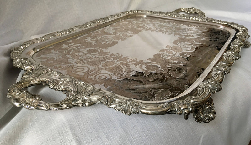 Georgian, George IV period, twin handled Old Sheffield Plate serving tray on four ornate feet. Circa 1820 - 1830.