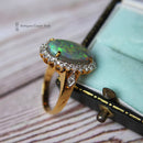 18ct Opal & Diamond Oval Cluster Ring
