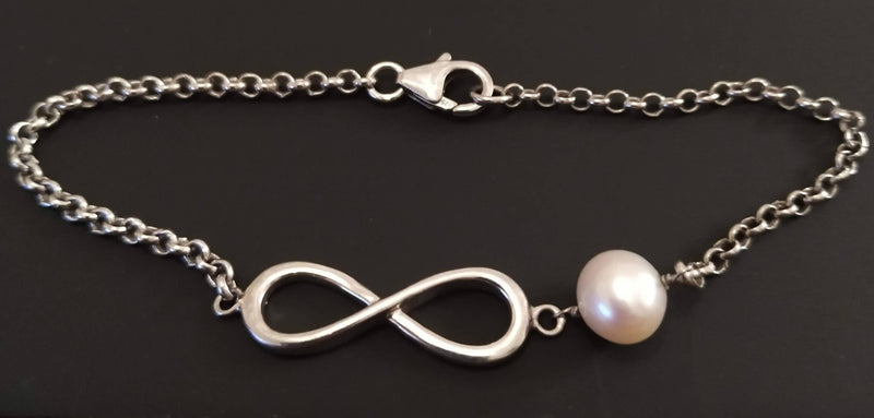 New sterling silver and pearl infinity bracelet