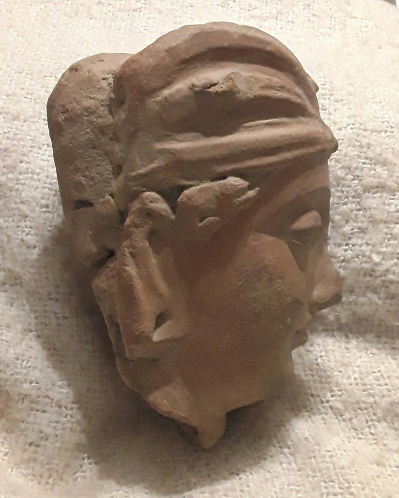 A Gandharan Culture Terracotta Head Of The God Buddha.