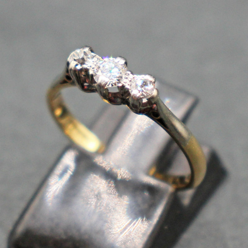 Platinum and 18ct gold 3 stone diamond ring