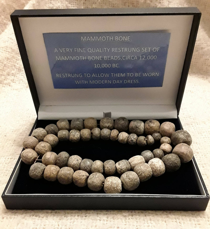 A Restrung Set Of Mammoth Bone Beads.