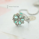 Platinum Emerald & Diamond Flower Cluster Pendant