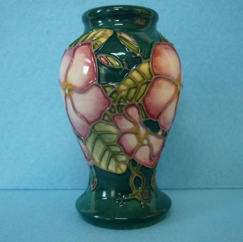 A Small Moorcroft Vase in the Mandeville Design by Angela Davenport.