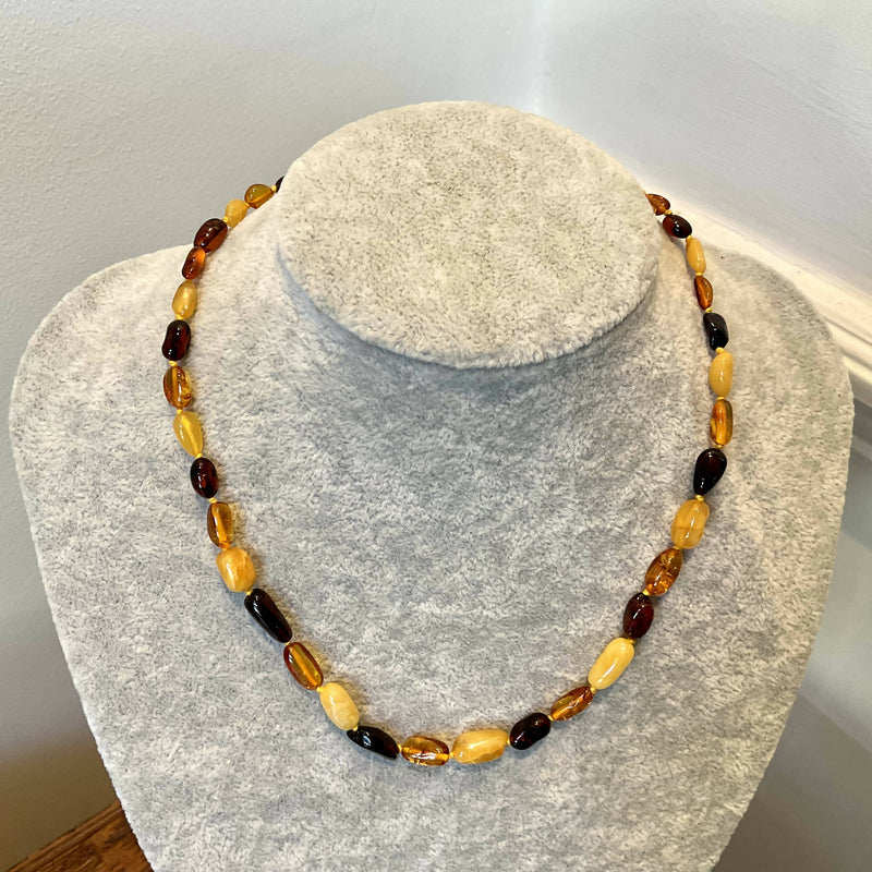 Varicoloured amber necklace