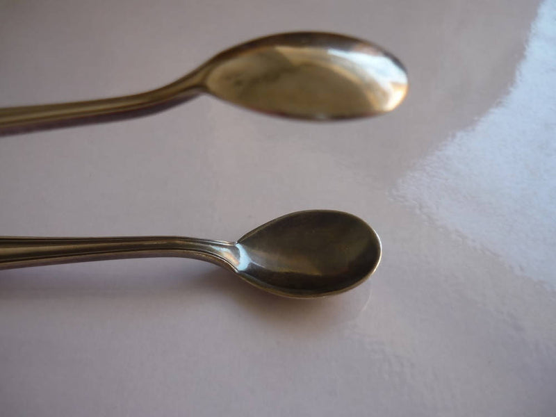 A Pair of Art Deco Style Silver Plate Sugar Tongues in the Pyramid Pattern