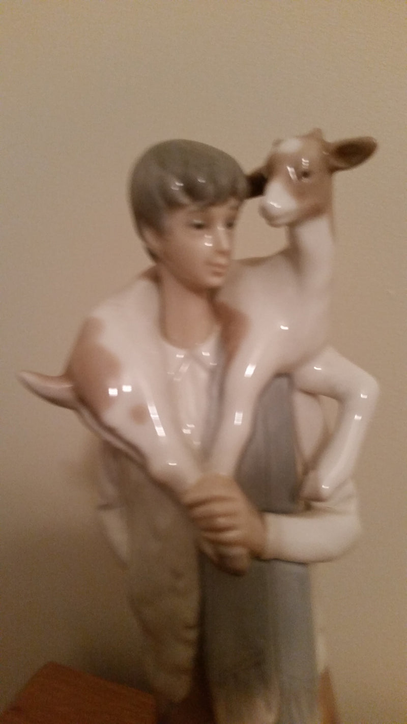 Lladro boy with a goat, ref number 4506