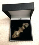 A Viking Large Bronze Equal Ended Cloak Brooch With Green Glass Bead Decoration.