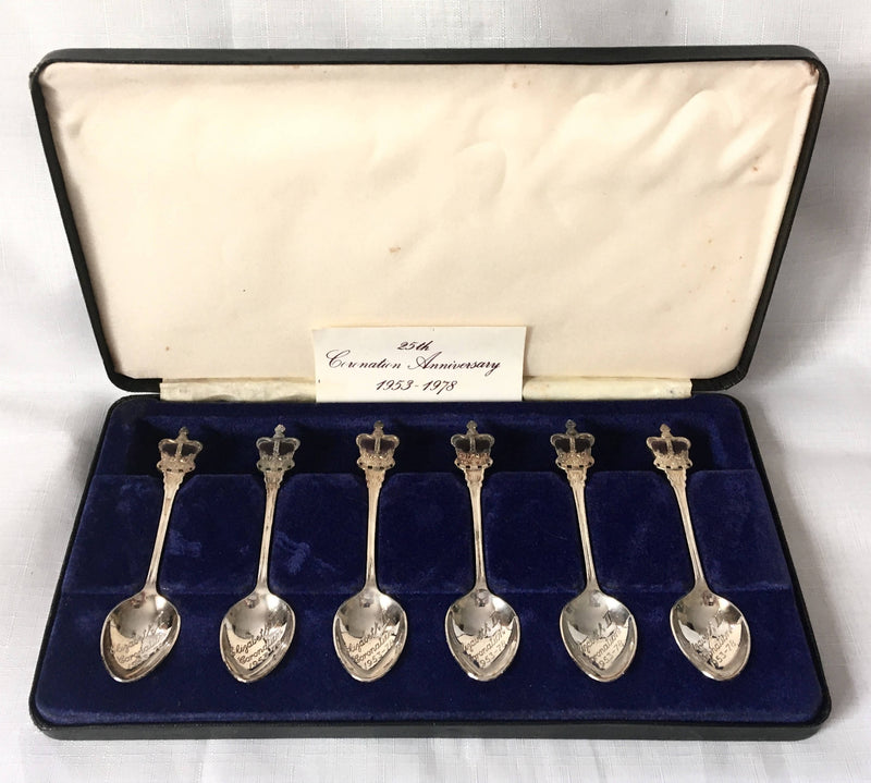 Cased set of Royal commemorative silver plated teaspoons with crown terminals.