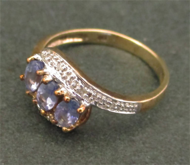 9ct gold, tanzanite and diamond crossover ring