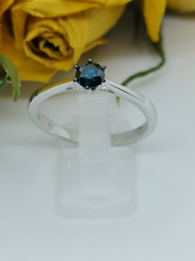 New 1/2 CT blue diamond solitaire ring (Size W)