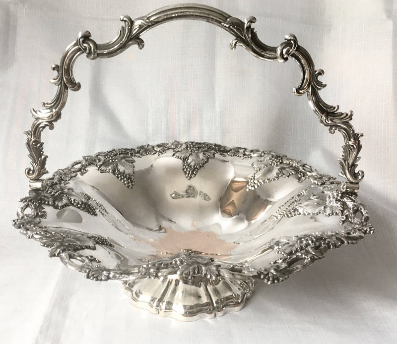 A striking late Georgian Old Sheffield Plate basket with applied fruiting vine decoration, circa 1830.