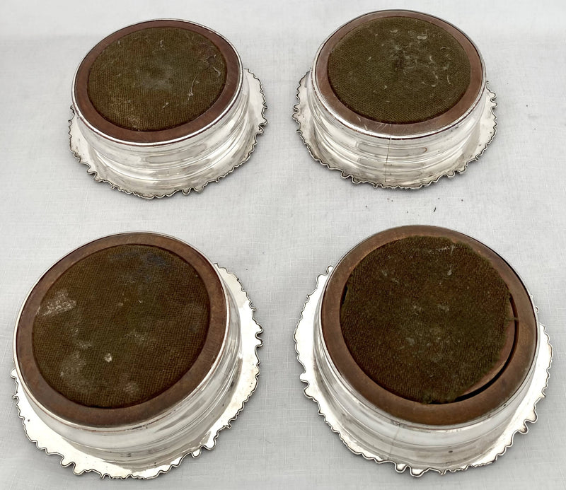 Georgian, George IV, Four Crested Old Sheffield Plate Wine Coasters. Circa 1820 - 1830.