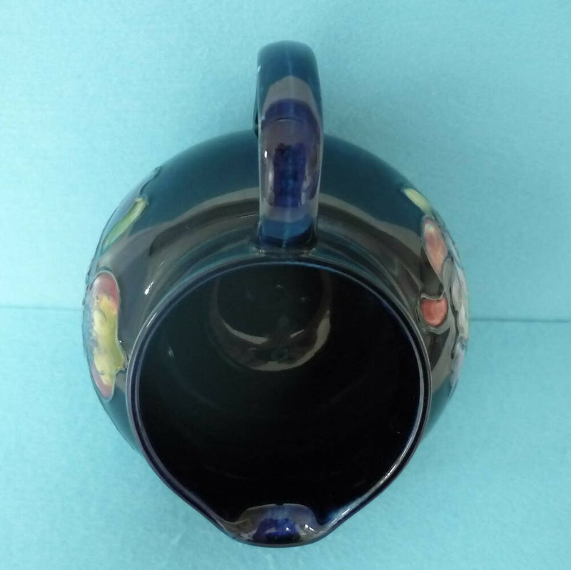 A Moorcroft (c1950's/60's) Jug in the Orchid Pattern by Walter Moorcroft