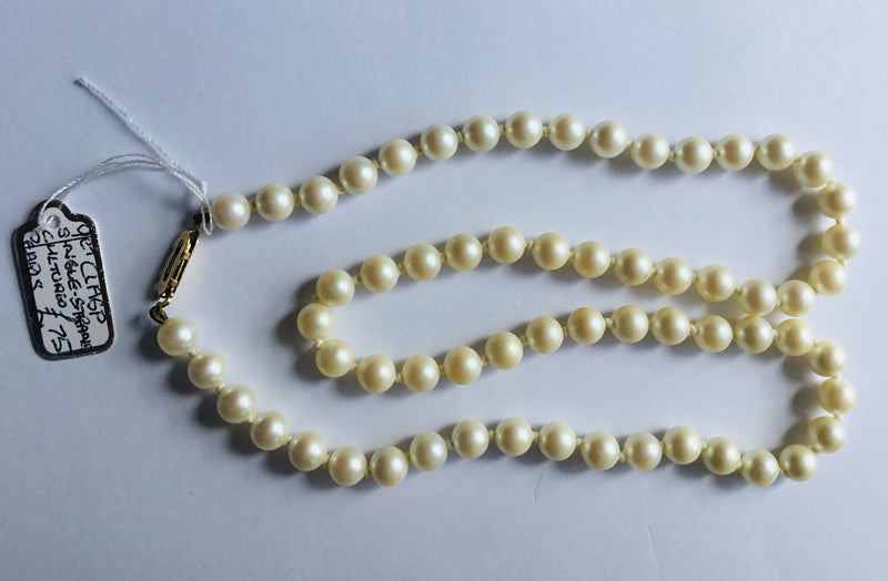 Single Strand Cultured Pearls. 9 carat clasp.